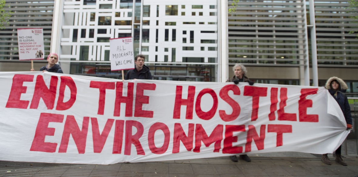 A protest against the B ritish Conservative government's hostile environment policies outside the Home Office in London Photo: Global Justice Now