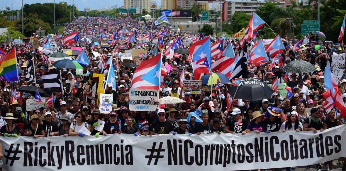 Thousands of Puerto Ricans gather for what many are expecting to be one of the biggest protests ever seen in the US colony