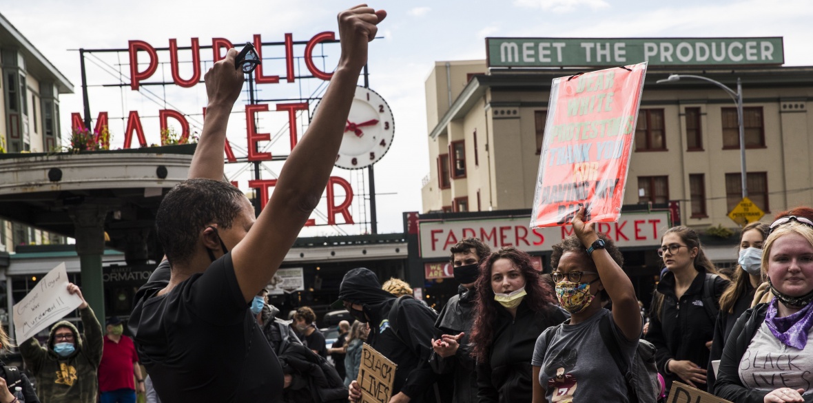 Protesters outside Seattle's Pike Place Market during the #SeattleJusticeForGeorgeFloyd march on Saturday, June 6
