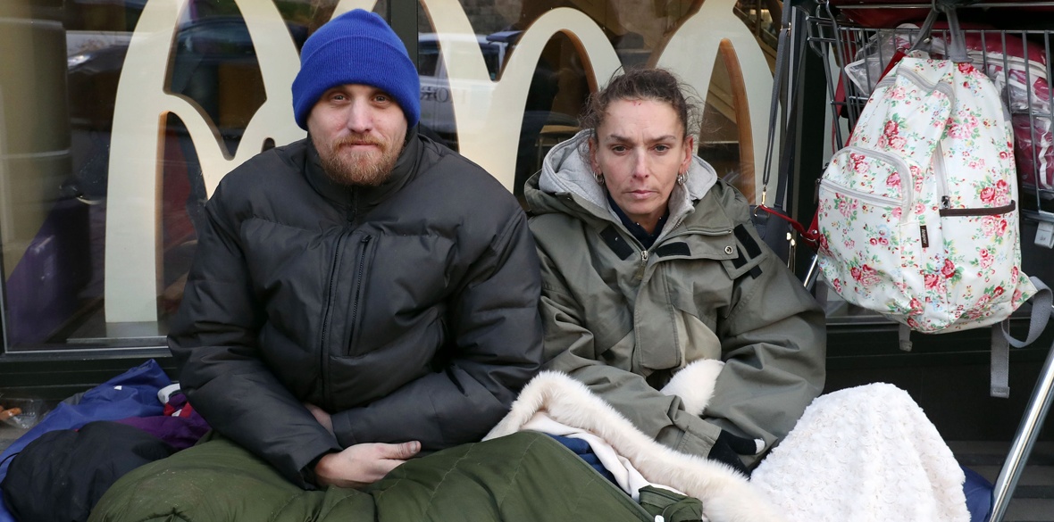 Homeless Britons James and Tracy with their possessions near Windsor Castle, Berkshire