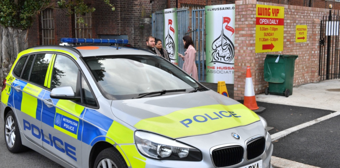 Police outside The Hussaini Association in Oxgate Lane, Cricklewood, London where two people were injured after a car hit pedestrians leaving the annual Al Hussaini Majlis just after midnight