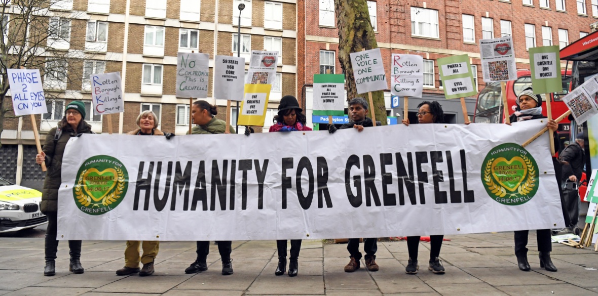 Protesters outside the Grenfell Tower public inquiry in London, where the second part of the inquiry into the Grenfell Tower fire, examining the circumstances and causes of the disaster, was due to start