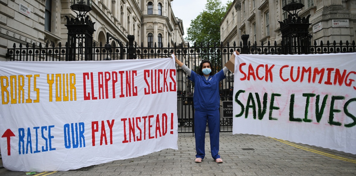 British nurse demonstrates in Downing Street, London against Conservative Prime Minoister Boris Johnson