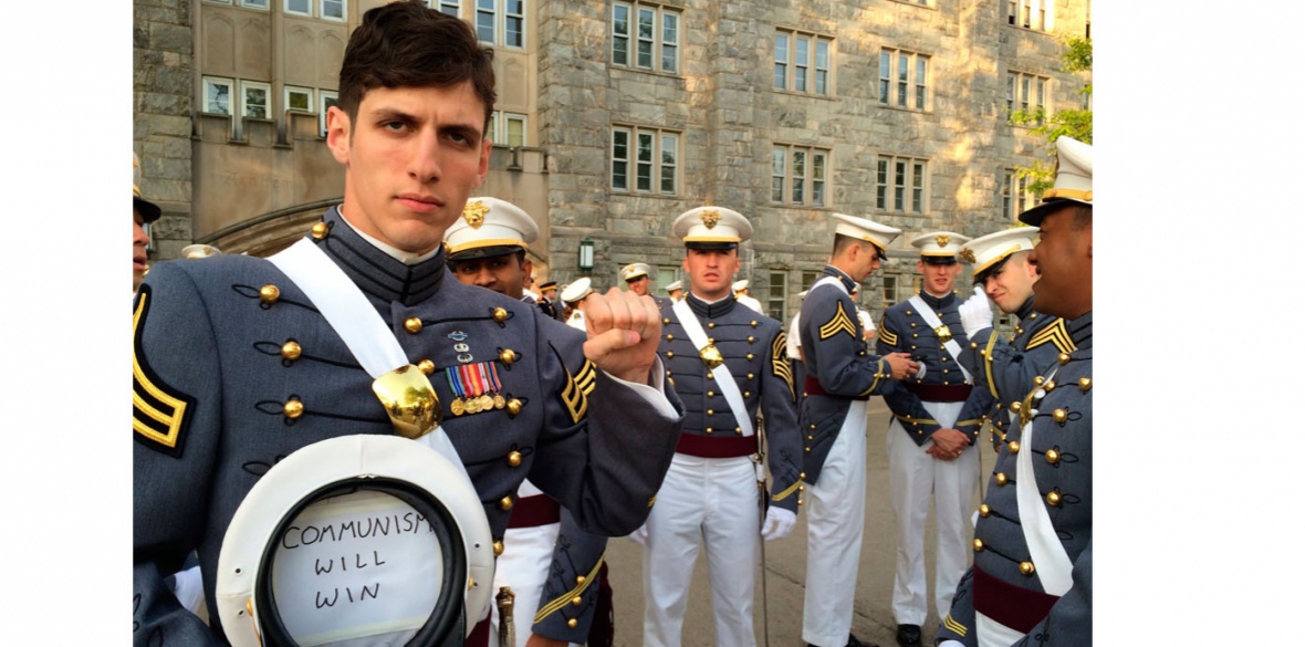 United States army cadet Spenser Rapone displays his cap with subversive message