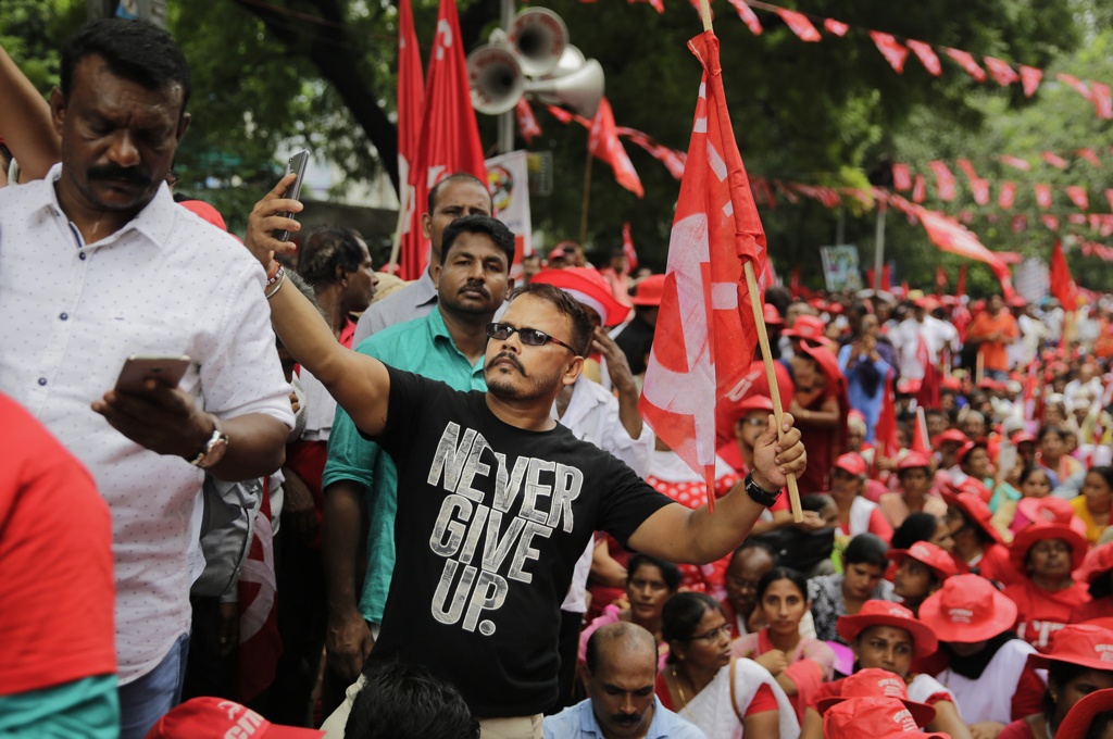 A protester takes a selfie during the demonstration