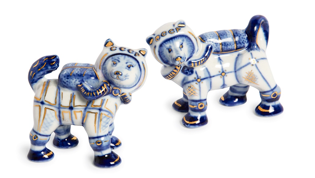 Hand-painted Gzhel porcelain figurines of Belka and Strelka wearing cosmonaut suits and breathing apparatus