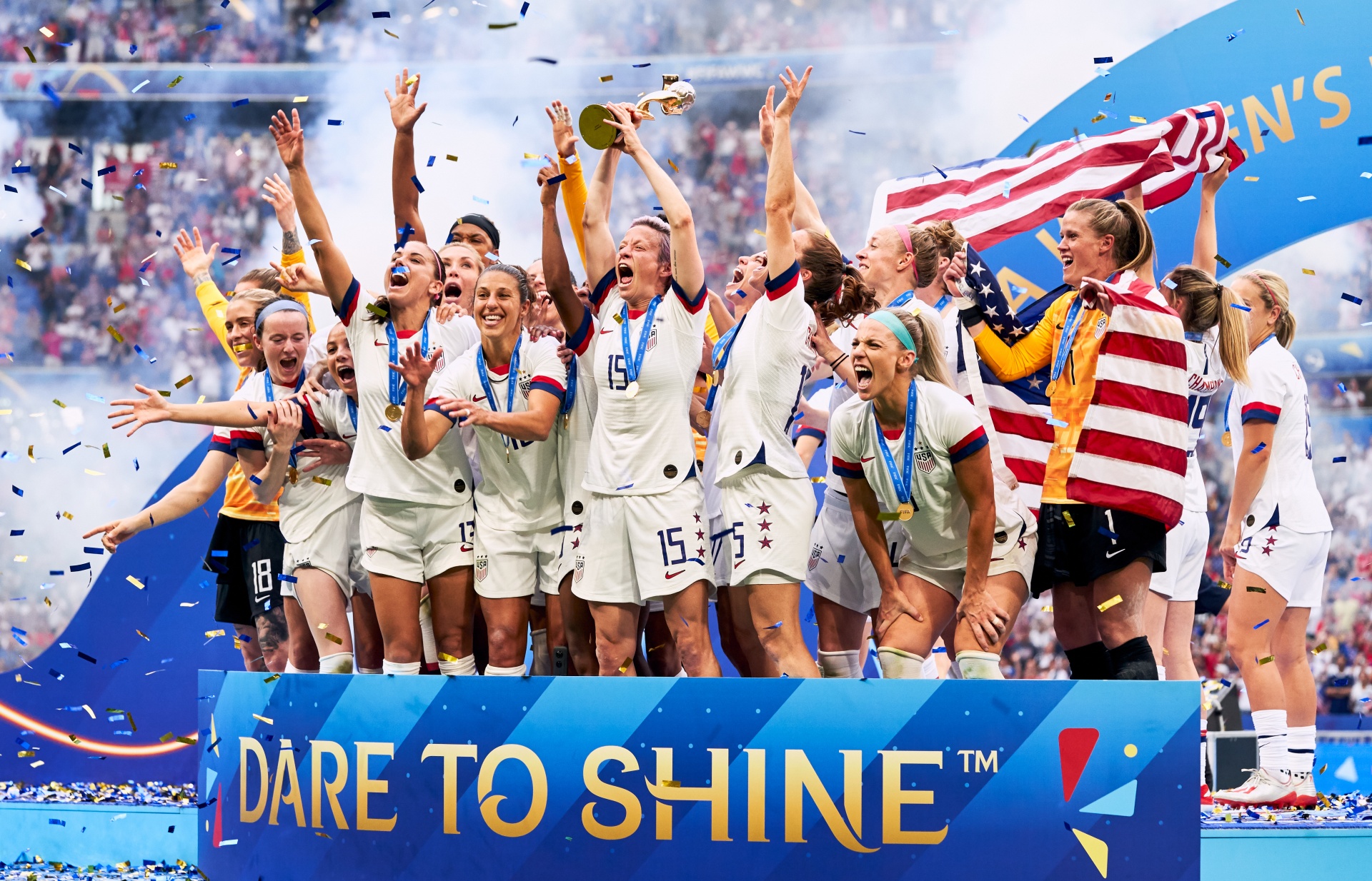 Megan Rapinoe (centre) and team-mates celebrate with the Fifa Women's World Cup Trophy after the final whistle after the FIFA Women's World Cup 2019 Final at the Stade de Lyon, Lyon, France