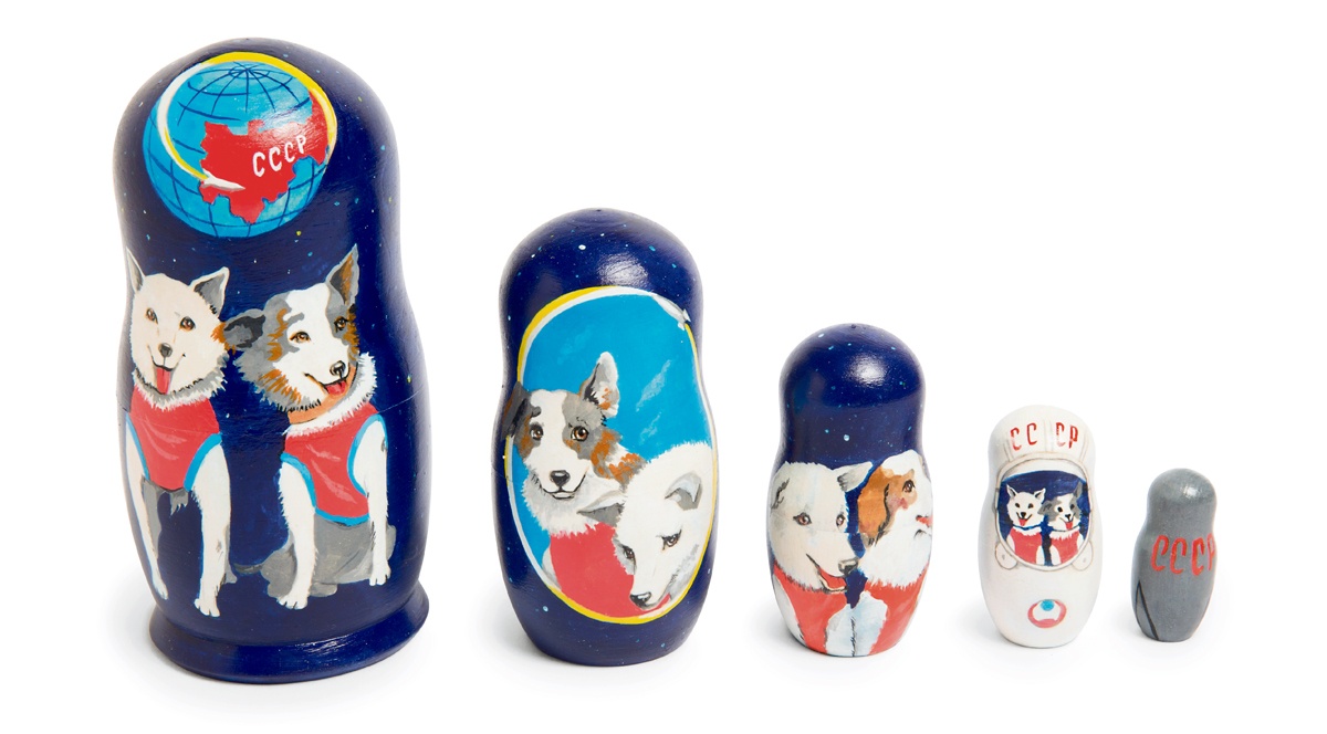 Set of five handmade and handpainted wooden nesting Matryoshka dolls. The largest is 15cm (6in) high.