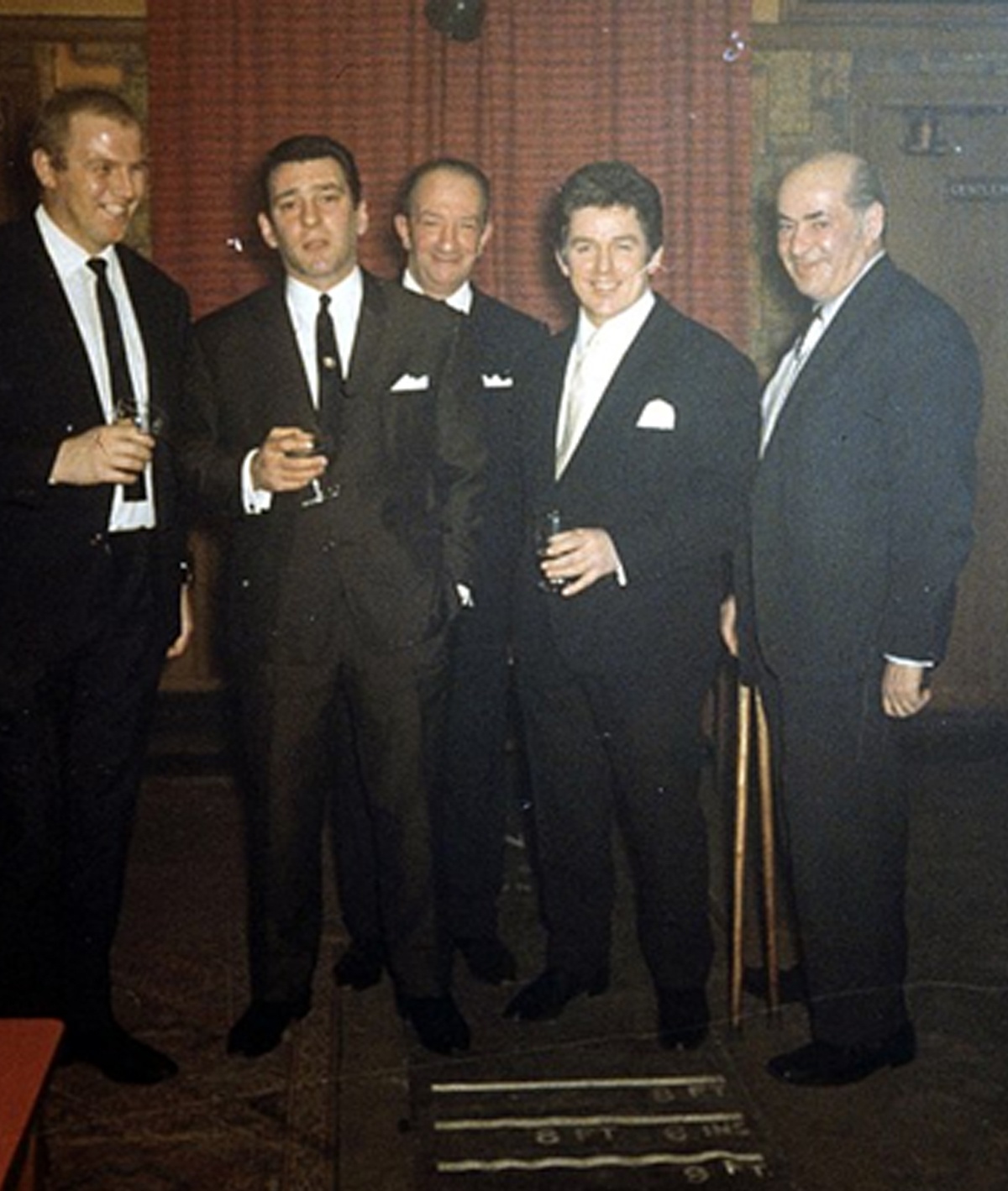 Photograph of London gangster Reggie Kray (second left) taken in the months leading up to his trial in 1968.