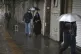 SHUTDOWN: People walk in front of shuttered shops at Tehran�