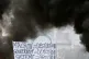 THE WRITTING IS ON THE PLACARD: “Macron, destitution, gove