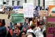 Protesters holding up signs during the International Women's