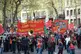 The London May Day Organising Committee banner is carried al
