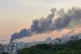 Smoke rises from the building of Iran's state-run television after an Israeli strike in Tehran, Iran, Monday, June 16, 2025