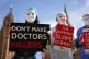 Campaigners protest outside Parliament in Westminster, London, ahead of a debate in the House of Commons on assisted dying, April 29, 2024