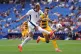 England's Harry Kane (left) and Andorra's Marc Garcia battle for the ball during the World Cup Qualifier at the RCDE Stadium in Barcelona, Spain, June 7, 2025