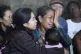 A relative of a passenger weeps after a ferry sank while en route to the resort island of Bali, in the waters off Banyuwangi, East Java, in Gilimanuk, Bali island, Indonesia, July 3, 2025