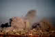Smoke rises following an Israeli military strike in the northern Gaza Strip, seen from southern Israel, Wednesday, Oct. 8, 2025