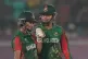 Bangladesh's Sobhana Mostary, left, celebrates after scoring fifty runs during the ICC Women's Cricket World Cup match between Australia and Bangladesh at ACA–VDCA Cricket Stadium in Visakhapatnam, India, Thursday, Oct. 16, 2025