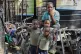 Children look at students attending school at a shelter for families displaced by gang violence in Port-au-Prince, Haiti, October 7, 2025