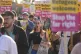 People take part in the Stand Up To Racism rally near the TLK Apartments and Hotel in Orpington, August 22, 2025