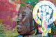 A mural of a woman laughing