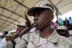 Tanzania security personnel salute as the national anthem is sung during the inauguration of Zanzibar President elect Hussein Ali Mwinyi of the ruling Chama Cha Mapinduzi (Revolutionary Party) at Amman Stadium in Zanzibar, Tanzania, November 1, 2025
