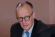 German Chancellor Friedrich Merz starts the cabinet meeting at the chancellery in Berlin, Wednesday, Nov. 5, 2025