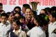 A music band of Indigenous children surrounds Mexican President Claudia Sheinbaum during her daily, morning press conference at the National Palace in Mexico City, Friday, Nov. 7, 2025