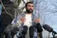 British political commentator Sami Hamdi speaks to the media in London, Thursday, Nov. 13, 2025, on his return to the U.K. after he was arrested by Immigration and Customs Enforcement on Oct. 26 while on a speaking tour in the U.S