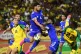 Curacao's Roshon Van Eijma, in the air, fights for the ball with Jamaica's Gregory Leigh (right) and Jonathan Russell during a World Cup 2026 qualifying soccer match in Kingston, Jamaica, November 18, 2025
