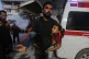 A Palestinian man carries a wounded girl into al-Shifa Hospital following Israeli strikes on the Gaza Strip, Saturday, Nov. 22, 2025