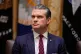 US Defence Secretary Pete Hegseth listens as President Donald Trump speaks during a cabinet meeting at the White House, Washington, December 2, 2025