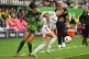 Bayern Munich's Giulia Gwinn (right) is challenged by VfL Wolfsburg's Cora Zicai, left, during the German women's Bundesliga soccer match between VfL Wolfsburg and FC Bayern Munich in Wolfsburg, Germany, October 11, 2025. Photo: Swen Pfoertner/dpa via AP