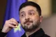 Ukraine's President Volodymyr Zelenskyy reacts during a press conference with German Chancellor Friedrich Merz at the Chancellery in Berlin, Germany, Monday, Dec. 15, 2025