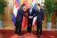 Cambodia's Foreign Minister Prak Sokhonn (left) shakes hands with Thai counterpart Sihasak Phuangketkeow (right) in front of China's counterpart Wang Yi in Yunnan province, China, December 29, 2025 [Pic: Agence Kampuchea Press]