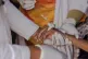 A young Malian woman is treated for her dangerously high fever and infection by doctors at the Douankaran health clinic in the Hodh El Chargui Region, Mauritania, November 7, 2025