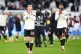 Liverpool's Andrew Robertson (left) and Joe Gomez applaud the fans following victory in the Premier League match at the London Stadium, November 30, 2025