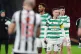 Celtic players look on as St Mirren lift the trophy after the Premier Sports Cup Final at Barclays Hampden, Glasgow, December 14, 2025