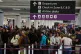 Passengers at Edinburgh Airport, July 19, 2024