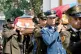 Fellow soldiers carry, on Wednesday in Caracas, the coffins of comrades killed in the US treacherous attack and capture of Venezuelan President Nicolas Maduro and his wife