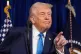 President Donald Trump points to a reporter to ask a question during a news conference at Mar-a-Lago, January 3, 2026, in Palm Beach, Fla.