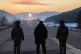 Kim Jong Un, center, inspects test-flights of hypersonic missiles, in Pyongyang, North Korea, January 4, 2026