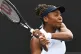 Venus Williams of the U.S. hits a backhand to Magda Linette of Poland during her singles match of the ASB Classic Women's Tennis Tournament in Auckland, New Zealand, January 6, 2026. Photo: Andrew Cornaga/Photosport via AP
