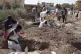 Members of the Sudanese Red Crescent rebury the remains of victims of Sudan’s two-year conflict, transferring bodies from makeshift graves to a local cemetery in Khartoum, Sudan, Sunday, Jan. 11, 2026
