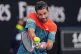 Cameron Norrie of Britain plays a backhand return to Alexander Zverev of Germany during their third round match at the Australian Open tennis championship in Melbourne, Australia, January 23, 2026