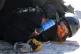 A protester is pepper sprayed at close range while being detained near the site of the fatal shooting of 37-year-old Alex Pretti by federal agents in Minneapolis on Saturday, Jan. 24, 2026