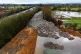 The 150m long mountain of rubbish that has been illegally dumped beside the A34 and near the River Cherwell in Kidlington, Oxfordshire, December 12, 2025