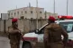 Syrian government forces stand guard at the al-Aqtan prison after taking control of it from the Kurdish-led Syrian Democratic Forces, SDF, in Raqqa, northeastern Syria, January 23, 2026