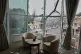 Broken window glass is seen in an apartment following a Russian air attack in the city center in Odesa, Ukraine, January 27, 2026